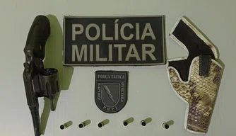 Arma de fogo e capsulas apreendidas em Marcolândia.