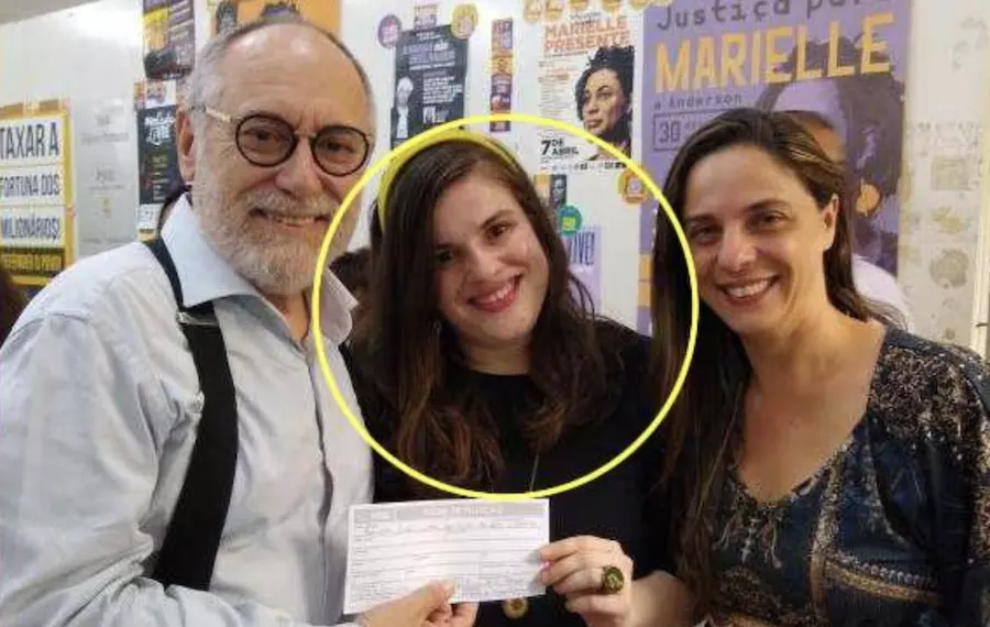 Mariana e os pais.