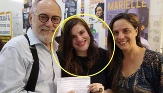 Mariana e os pais.