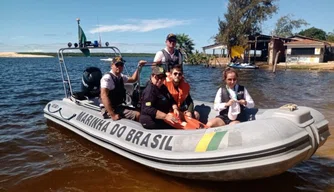 Fiscais ambientais em visita a Lagoa do Portinho.